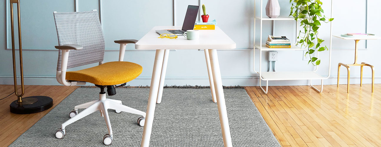 Minimalist Reya Home Edition Desk assembles in seconds with SitOnIt's innovative patent-pending design.