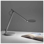 Humanscale Nova lamp, a minimalist desk lamp with a sleek, adjustable design.